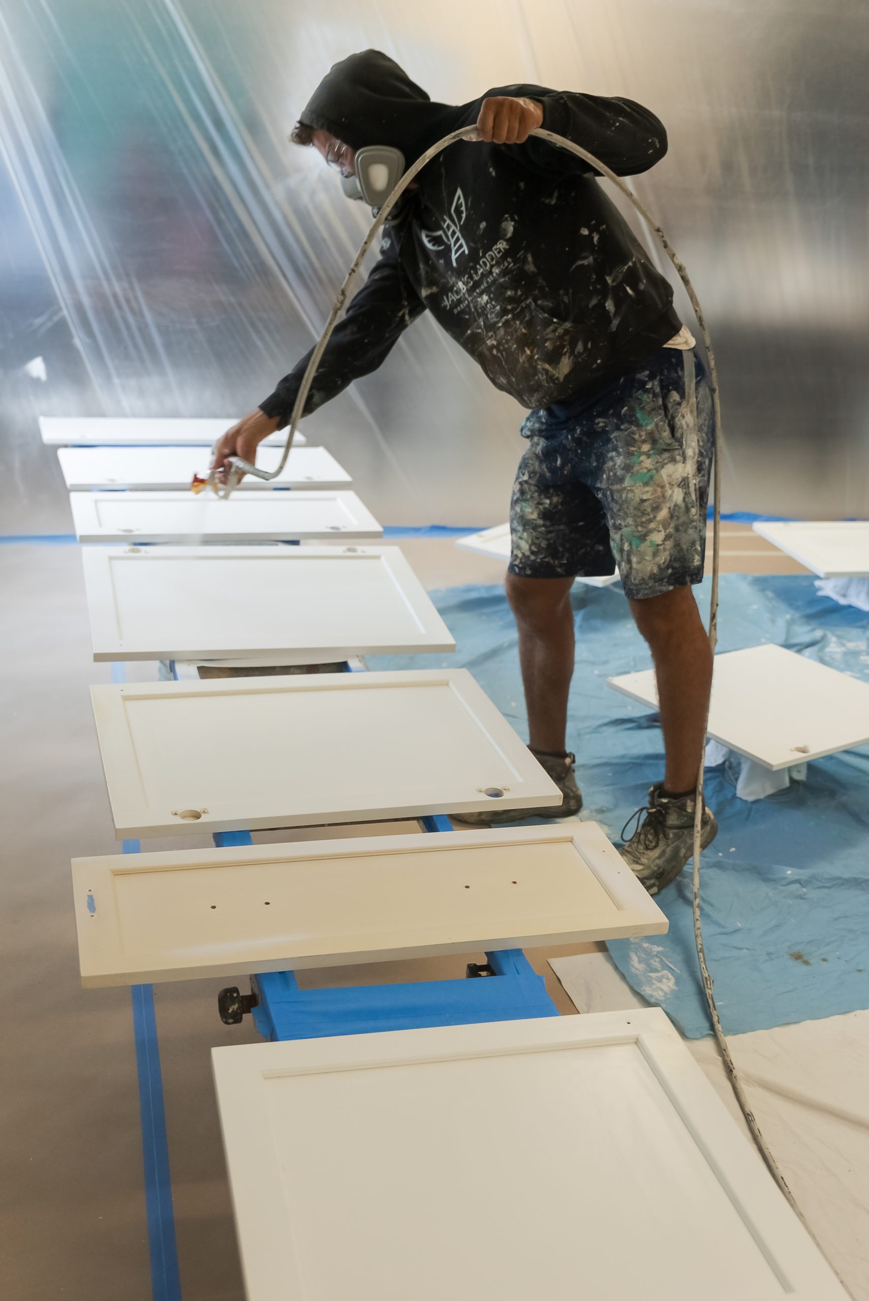 Professional spray painting project by T&H Painting, Bermuda — smooth factory finish